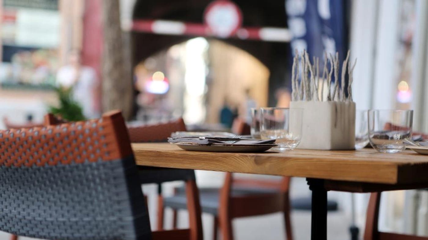 Dining room of a restaurant group location at dusk